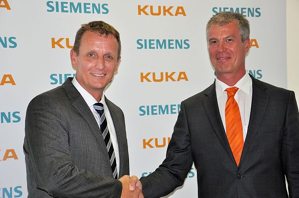 Robert Neuhauser (Siemens, links) en Manfred Gundel (Kuka) willen de samenwerking tussen beide concerns intensiveren. 
